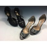 Manolo Blahnik, a pair of silver peep toe shoes, with diamante buckle, size 38.5, together with a