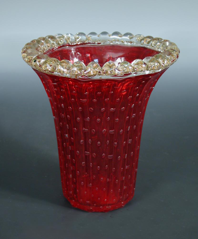 Pino Signoretto for Murano, a flared glass vase, the reeded red glass form with bubble inclusions