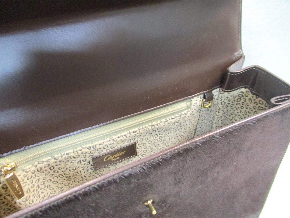 Cartier, a brown ponyskin handbag, with gilt 'panthere' clasp and original dust bag 22 x 28cm (9 x - Image 4 of 5