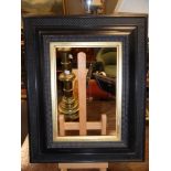 A 19th Century German ebonised ripple moulded rectangular frame having a gilt slip, the verso