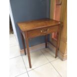 A Georgian fruitwood side table with rectangular top fitted with a drawer on moulded and chamfered