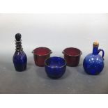 A Regency Bristol blue decanter, finger bowl and two ruby glass rinsers