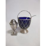 A blue glass lined silver sugar bowl, London 1906, a sifter spoon together with a George III