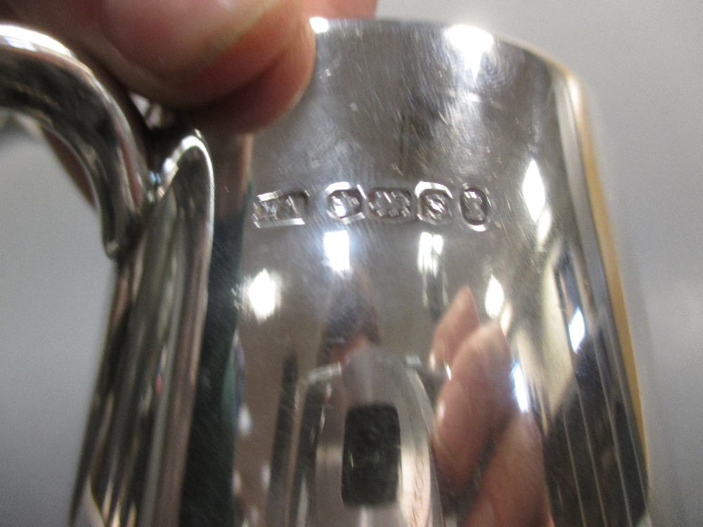 A silver helmet shaped cream jug together with a silver 'Ovaltine' half pint mug - Image 4 of 5