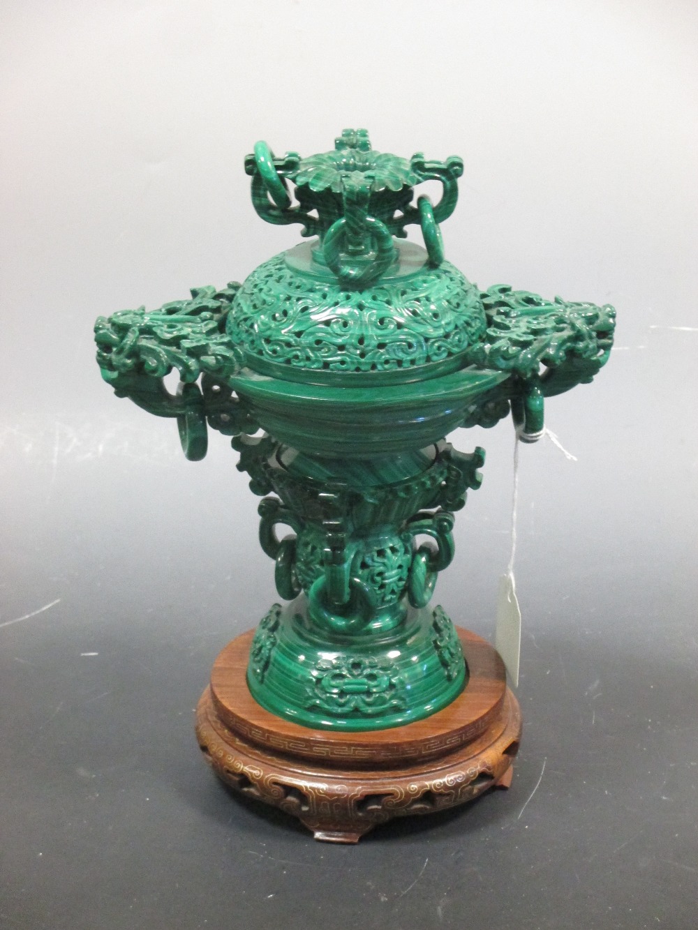 A modern Chinese malachite three part vase with wood stand Bowl cracked and damaged to the rim