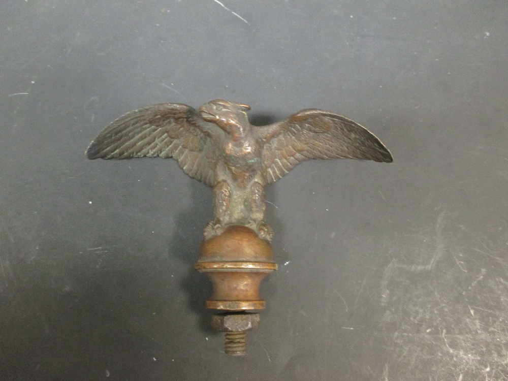 A bronze eagle mascot