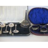 Four silver soup spoons together with an EPNS wine funnel and four salts