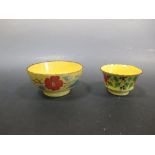 Two early 19th century yellow ground pottery bowls