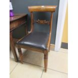 A set of six Regency rosewood bar back dining chairs