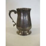 A silver tankard of baluster form, London 1776