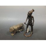 A Benin bronze figure of a warrior together with a figure of a dog (2)