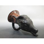 A late 19th century redware rhyton ramshead after the ancient Greek Attic Ware