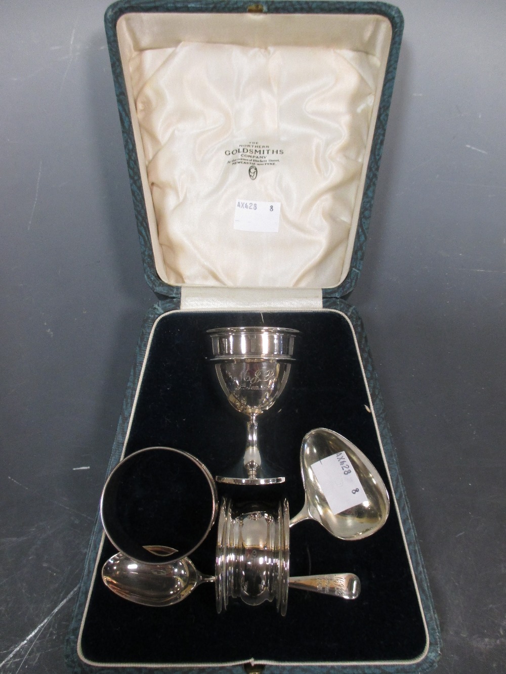 A cased silver christening set