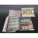 GB modern stamps, an album with 'smilers' sheets, presentation packs, 'post & go' prepaid stamps,