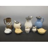 Salt glazed stoneware and caneware by Copeland, Wedgwood et al., five jugs, three tea pots and a