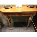 A George III mahogany card table, on tapering reeded legs, 75cm hg x 91cm w