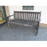 A teak garden bench with brass plaque ' made from timber from HMS Ganges', 153cm wide