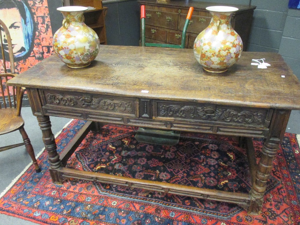 A Spanish oak table, 165cm wide x 79cm depth