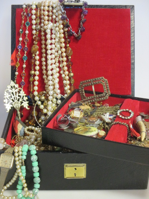 A black leather jewellery box together with a quantity of mixed costume and dress jewellery