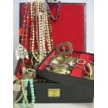 A black leather jewellery box together with a quantity of mixed costume and dress jewellery