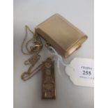 A 9ct gold ingot necklace and a 9ct card case, 62g