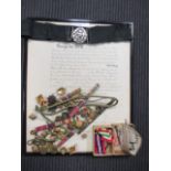 A collection of medals and military buttons; an MBE certificate