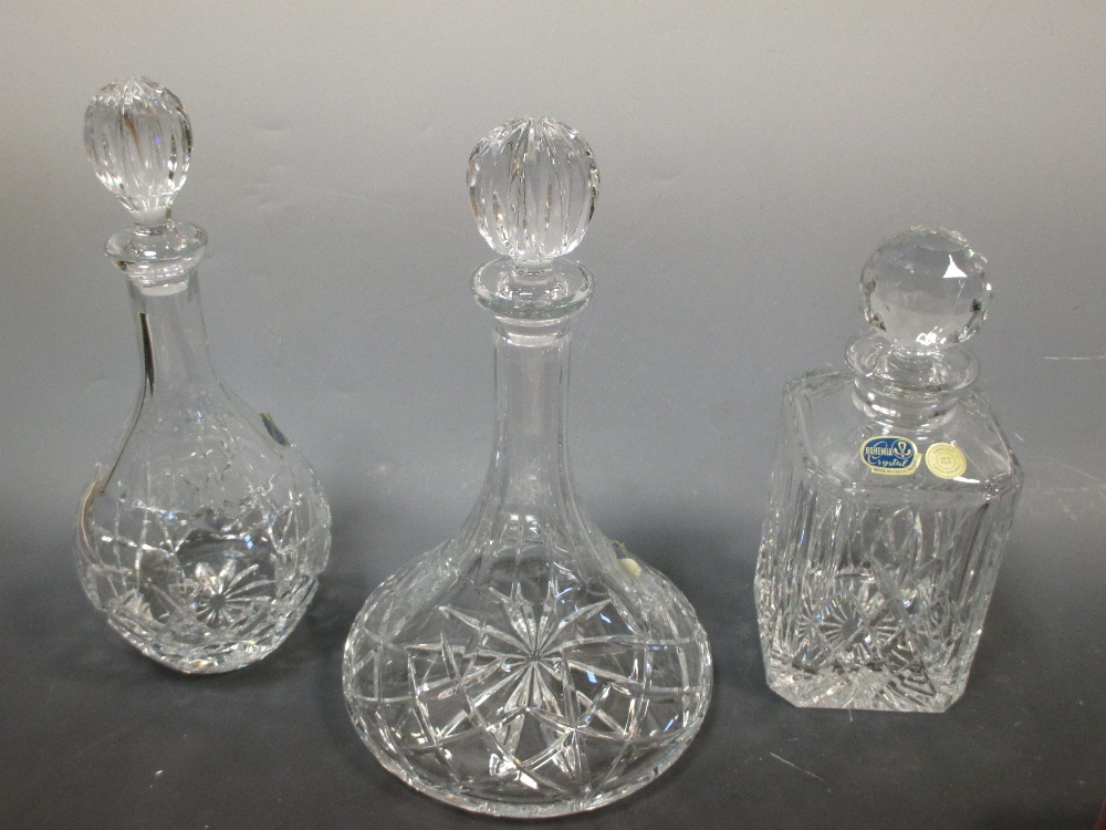 Three Bohemia Crystal decanters, two other boxed sets of glass, stoppers and miscellaneous glass