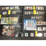 A modern GB stamp album, with many hundreds of £s in unused face value, commemoratives, blocks and