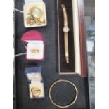 A quantity of assorted gold jewellery to include a lady's 9ct Omega wristwatch, two 22ct carat