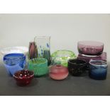 Thirteen coloured glass wares by Phil Oakly, Caithness, Mdina, Kosta Boda and others