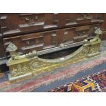 A Regency style gilt brass fire curb, 95cm