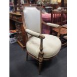 A Louis XVI style walnut fauteuil, 90cm high