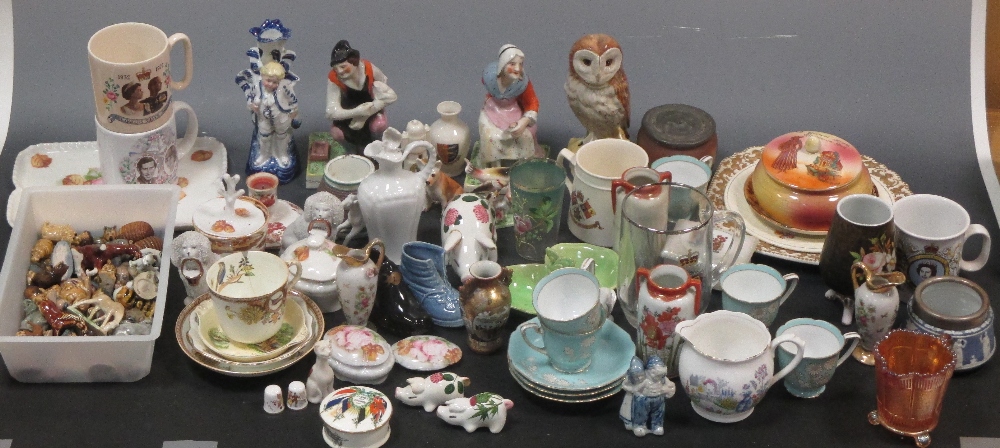 A collection of ceramics and glass figures and animals, souvenir and commemorative wares,