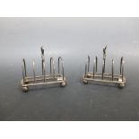 A pair of silver toast racks, London 1901, (2)