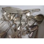 A quantity of mixed silver knives and forks together with a white metal Continental cutlery set
