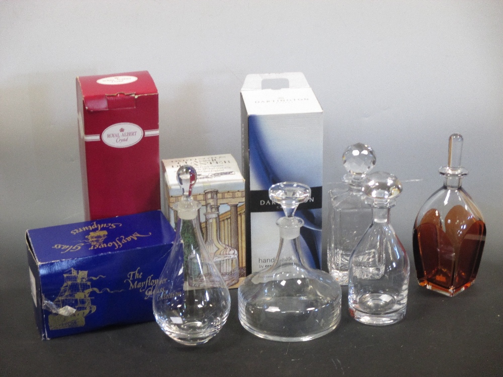 A Dartington carafe and beaker together with eight decanters by Zaglo, Dartington, Royal Albert