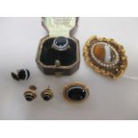 A 19th century banded agate, pearl and black enamel brooch, 5.2cm long, (tests as 14ct-18ct gold,