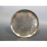 A plain circular tray edge waiter, presented to Major M C Barraclough of the 4th/ Royal Dragoon