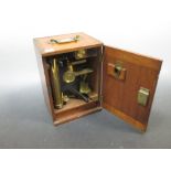 A Manson & Swan mahogany cased brass microscope, a clarinet and an oboe (3)