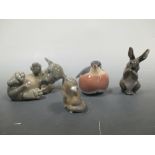 A Royal Copenhagen figure of a Puppy, a Robin, a Rabbit and an Otter (4)