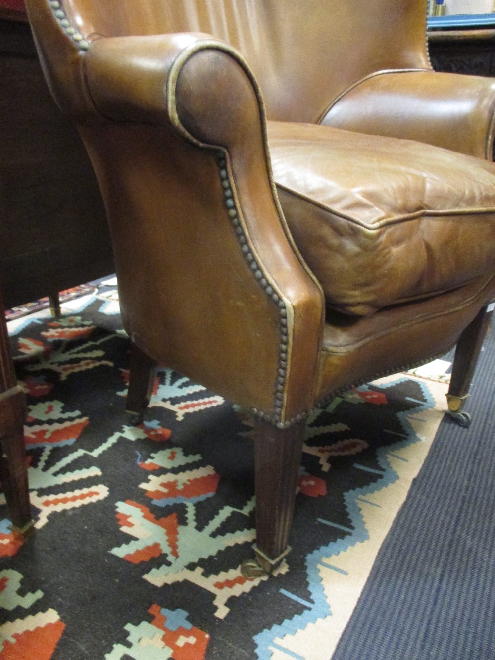 A George III style leather upholstered barrel back armchair - Image 2 of 3