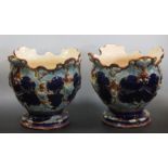 A pair of late 19th century English pottery planters