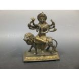 An Indian parcel gilt and silvered figure of Durga