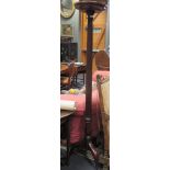 A mahogany torchere 162cm high