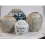 A collection of Oriental blue and white ginger jars, some used as lamp bases