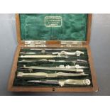 A mother of pearl small pen knife with carved hand handle and various items