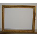 A plain wooden gilded frame, 125 x 100 cm sight size; Egg and dart 19th Century wooden frame, 81 x