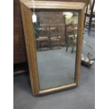 An oak framed mirror 67 x 43cm