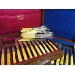 A part set of silver bladed fish knives and forks together with three cased sets of plated fish...