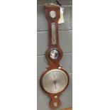A 19th century banjo barometer with silvered dial